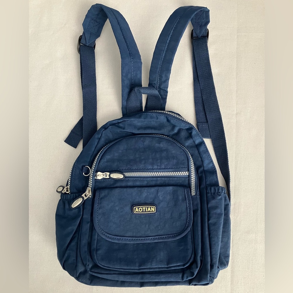 Blue Mini Bag with Adjustable Straps and Durable Material
